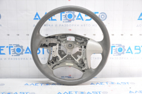 The steering wheel is bare, Toyota Camry v40 SE, gray tires, without cruise control.