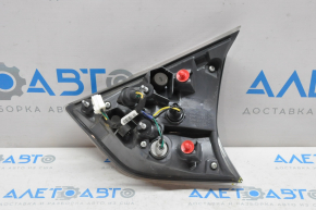 Inner taillight trunk lid left Nissan Rogue 14-16, water damage, chip