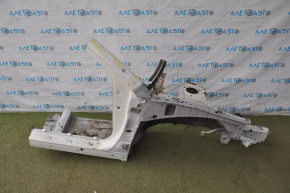 The front right quarter of a Toyota Avalon 05-10 is white and dented.
