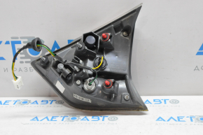 Light inside trunk lid left Nissan Rogue 14-16, water damage