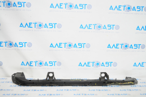 TV lower bar Nissan Rogue 14-20 bend, 7/10, dented edge