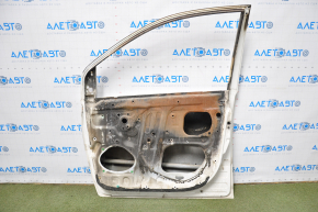 The door is bare, front right, Toyota Sienna 04-09, burnt white, bumps