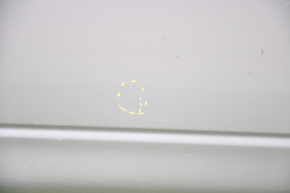 The front right door of a Nissan Murano z50 03-07 is bare and silver. It has a dent and bumps.