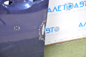 The front left door of a Mazda6 03-08 is bare and blue, dented at the pillar, with bumps.