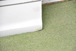 The door is bare, front left, Toyota Sienna 04-09, white, dented corner, bumps, burnt