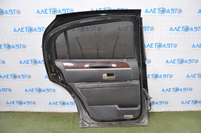 Rear left door assembly for a 98-11 Lincoln Town Car, black trim, chrome trim