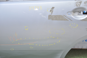 The door is bare, rear left, Mitsubishi Galant 04-06 pre-rest silver, dented, bumps