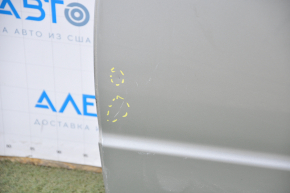 Subaru b9 Tribeca rear left door assembly, silver, dent in the lower corner, bumps, painted