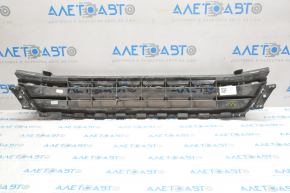 Lower grille of the front bumper of a VW Jetta 15-18 USA without parking sensors, pressed from below, tears