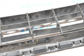 Lower grille of the front bumper of a VW Jetta 15-18 USA without parking sensors, pressed from below, tears