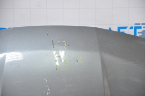 The bare hood of a Nissan Murano z50 03-06 graphite bumper