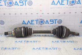 The front left drive axle shaft of a Nissan Murano z50 03-07 has a torn outer boot.