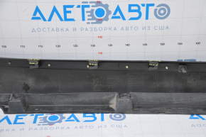 The left threshold of the Chevrolet Volt 11-15 with a seal is dented, the fasteners are broken, there are tears, and it is filed down.