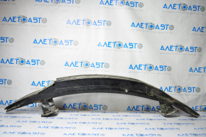 The front bumper reinforcement of the Tesla Model S 12-15 pre-restoration is dented on the right side, the fangs are cracked