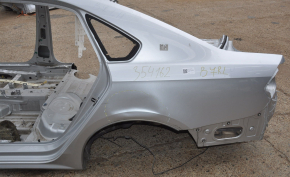 Quarter wing rear left VW Passat b7 12-15 USA silver on body, dented, bumps