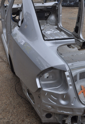 Quarter wing rear left VW Passat b7 12-15 USA silver on body, dented, bumps
