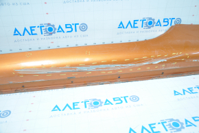 Left side sill for Nissan 350z 03-09, orange, broken fasteners, cracks, dents, scratches, painted