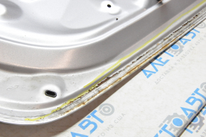 Boot lid Ford Focus mk3 11-14 prerest 4d silver UX, a number of small dents, rust