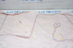 The right side curtain airbag on a Tesla Model S 12-20 is cut.