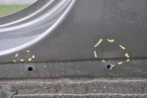 The central left body pillar of Chevrolet Volt 16 is sawn off, dented
