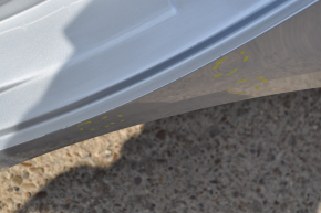 Quarter wing rear left VW Jetta 11-18 USA silver on body, dented, bumps