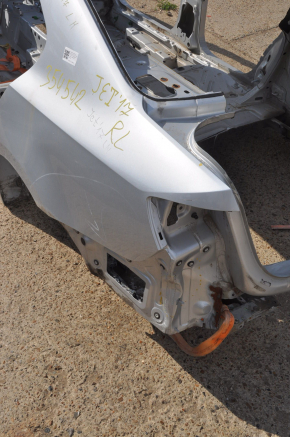 Quarter wing rear left VW Jetta 11-18 USA silver on body, dented, bumps