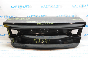 Trunk lid Dodge Dart 13-16 dented on the left, bump, painted
