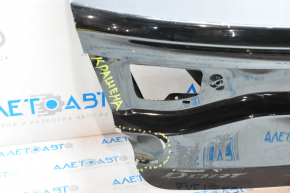 Trunk lid Dodge Dart 13-16 dented on the left, bump, painted