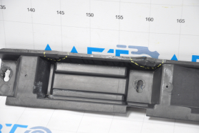 The left door sill trim of a Mercedes X164 GL is dented under the sill.