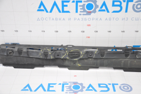 The left Tesla Model S 12-15 pre-rest battery mount is dented and the plastic cover is torn.