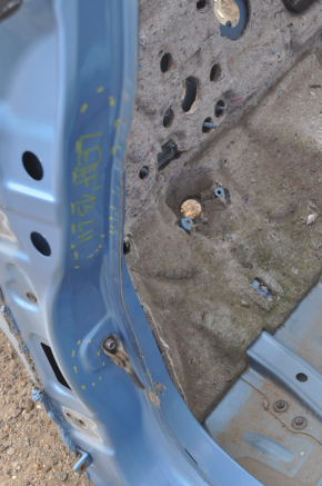 Front left quarter Nissan Leaf 13-17 blue on the body, bent side member, bumps