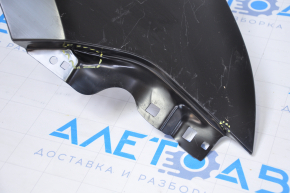 The front right fender of a Ford Focus 2008-2010 is dented, the mount is damaged, the bump is broken
