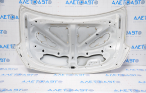 The trunk lid of a Toyota Solara 2.4 04-08 dent