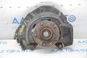 The trunnion with the hub front left Toyota Sienna 04-10 with the ABS sensor, with the casing, with the ball, the bearing hums,