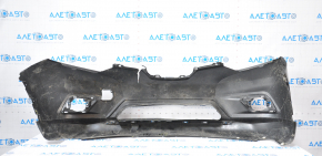 Bare front bumper for a 14-16 Nissan Rogue without a license plate, black, dented, with tears, broken fasteners, filed down, and scratches.