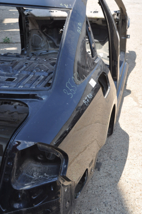 Quarter wing rear right VW Passat b7 12-15 USA black on body, pokes