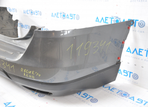 Bare rear bumper Nissan Rogue 14-16 graphite, dented left side, missing fragment, tears, broken fasteners, scratches