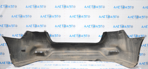 Bare rear bumper Nissan Sentra 16-19 rest black tear at the bottom, torn fasteners, sawed corner, dented