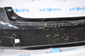 Bare rear bumper for Lexus GS300 GS350 GS430 GS450h 06-07 without parking sensors, black, dented, missing fragment at the bottom, broken fasteners, non-factory holes
