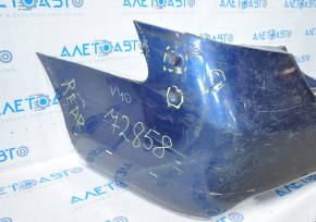 The rear bumper is bare, Toyota Camry v40 07-11 3.5 SE blue, dented, torn, with broken fasteners.