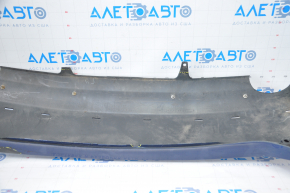 The rear bumper is bare, Toyota Camry v40 07-11 3.5 SE blue, dented, torn, with broken fasteners.