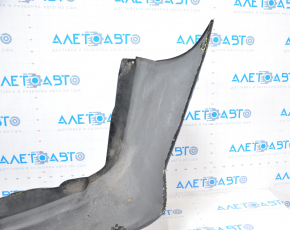 The rear bumper is bare, Toyota Camry v50 12-14 USA LE XLE black, dented, with tears and broken fasteners.