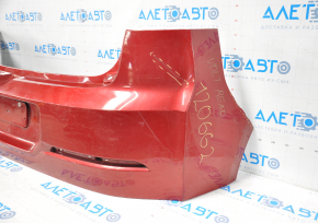 Rear bumper bare Chevrolet Volt 11-15 red dented and torn on the left, fasteners torn, fasteners torn on the right