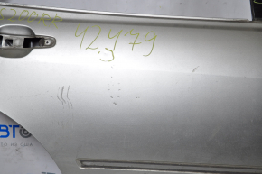 The door is bare rear right Lexus IS200 IS300 99-05 silver dent bump