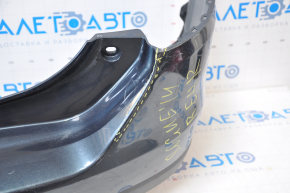 The rear bumper is bare, Nissan Rogue 14-16 blue, the left side is torn, the fasteners are torn, there is a dent in the center, and there are scratches.