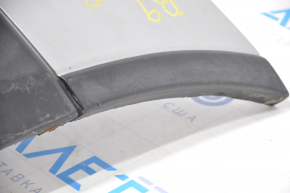 Subaru b9 Tribeca 2006-2007 silver rear bumper, torn fasteners, dented at the bottom, scratches