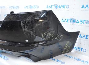 Jaguar XF X250 07-15 black bare rear bumper, for parking sensors, with a lower lip, torn fasteners, dents