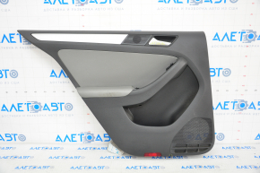 Door trim card rear left VW Jetta 11-16 USA black with gray chrome insert, scuff