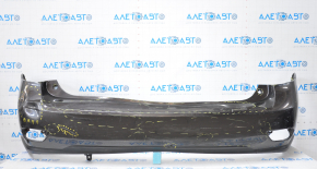 The rear bumper is bare, Lexus RX350 RX450h 10-15 graphite, dented, with tears and broken fasteners.