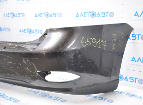 The rear bumper is bare, Lexus RX350 RX450h 10-15 graphite, dented, with tears and broken fasteners.
